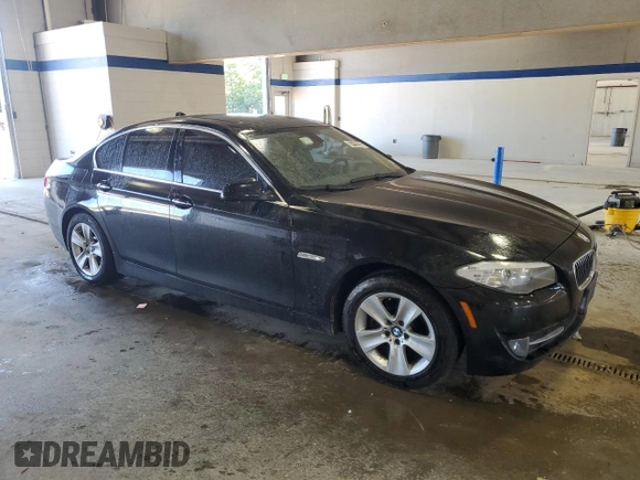 2013 BMW 5 Series 528i xDrive with VIN WBAXH5C51DD112846, listed as a Copart auction lot 57757235 with 119,511 mi miles and Clean title. Bid and sale history available at DreamBid. Image 4.