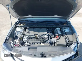 2024 Toyota Camry LE z VIN 4T1R11AKXRU883388, wystawiony jako IAAI lot #41977607 z przebiegiem 8 784 mil mil oraz . Historia ofert i sprzedaży dostępna na DreamBid. Obrazek 10.