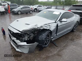 2020 Ford Mustang EcoBoost with VIN 1FA6P8TH3L5111659, listed as a IAAI auction lot 42115879 with 93,928 mi miles and . Bid and sale history available at DreamBid. Image 2.