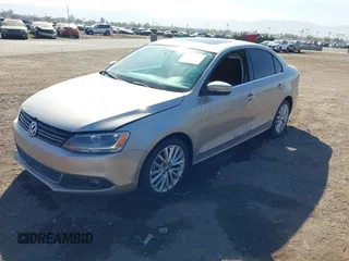 2013 Volkswagen Jetta TDI w/Premium with VIN 3VWLL7AJ6DM234664, listed as a IAAI auction lot 41555219 with 131,692 mi miles and . Bid and sale history available at DreamBid. Image 2.