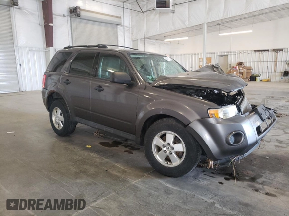 2011 Ford Escape XLS with VIN 1FMCU0C75BKB73848, listed as a Copart auction lot 55879105 with Not provided miles and Non repairable. Bid and sale history available at DreamBid. Image 4.