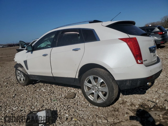 2016 Cadillac SRX Performance Collection with VIN 3GYFNCE38GS576027, listed as a Copart auction lot 52863115 with 85,615 mi miles and Salvage title. Bid and sale history available at DreamBid. Image 2.