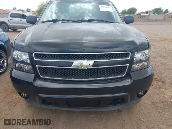 2007 Chevrolet Tahoe LS with VIN 1GNFC13C07J400472, listed as a IAAI auction lot 42209311 with 212,924 mi miles and . Bid and sale history available at DreamBid. Image 6.