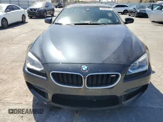 2015 BMW M6 z VIN WBSLX9C58FD160609, wystawiony jako Copart lot #56992535 z przebiegiem 52 324 mil mil oraz Tytuł czysty. Historia ofert i sprzedaży dostępna na DreamBid. Obrazek 5.