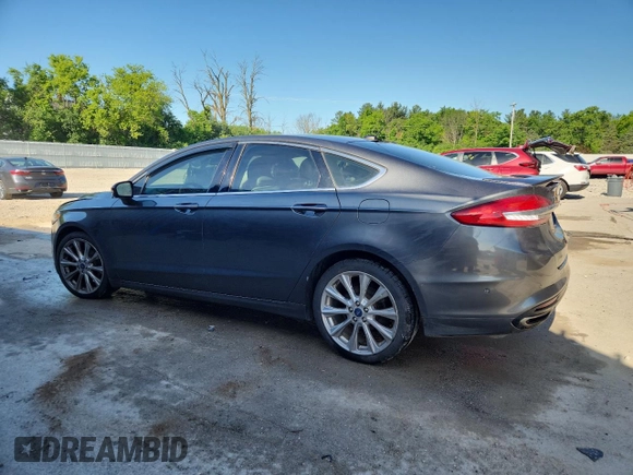 2017 Ford Fusion Titanium z VIN 3FA6P0D96HR251752, wystawiony jako Copart lot #61568705 z przebiegiem 173 479 mil mil oraz Nie do naprawy • Non repairable. Historia ofert i sprzedaży dostępna na DreamBid. Obrazek 2.