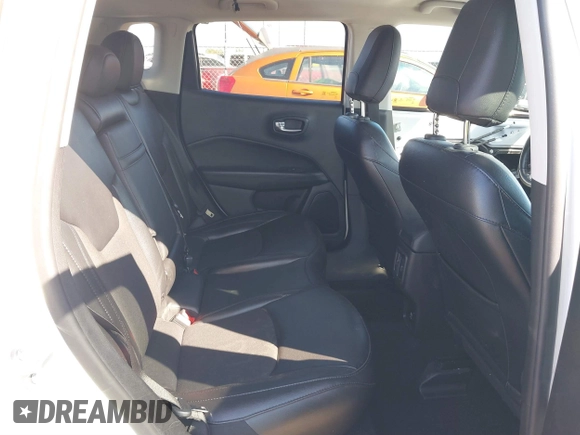 2020 Jeep Compass Latitude with VIN 3C4NJCBB6LT147594, listed as a IAAI auction lot 41592201 with 32,383 mi miles and . Bid and sale history available at DreamBid. Image 8.