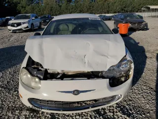 2001 Chrysler Concorde LXi z VIN 2C3HD36J21H586775, wystawiony jako Copart lot #80456624 z przebiegiem 124 668 mil mil oraz Szkoda całkowita • Salvage title. Historia ofert i sprzedaży dostępna na DreamBid. Obrazek 5.