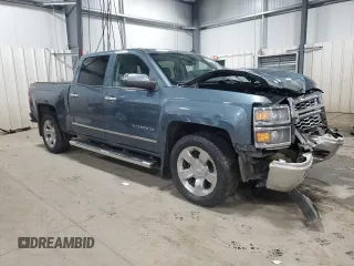 2014 Chevrolet Silverado 1500 LTZ with VIN 3GCUKSEC9EG245991, listed as a Copart auction lot 46620565 with 128,370 mi miles and Salvage Title. Bid and sale history available at DreamBid. Image 4.