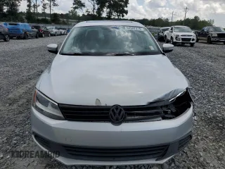2012 Volkswagen Jetta SE with VIN 3VWDX7AJ1CM389131, listed as a Copart auction lot 64947474 with 140,331 mi miles and Salvage title. Bid and sale history available at DreamBid. Image 5.