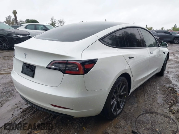 2023 Tesla Model 3 with VIN 5YJ3E1EA3PF401446, listed as a IAAI auction lot 41565881 with Not Provided miles and . Bid and sale history available at carsss.com. Image 4.