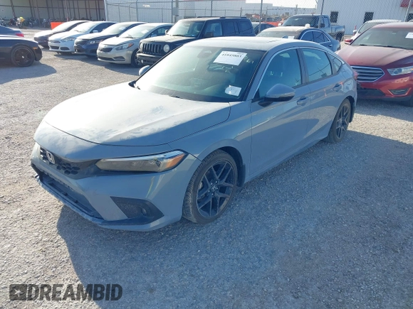 2022 Honda Civic Sport Touring z VIN 19XFL1G89NE009751, wystawiony jako IAAI lot #41845803 z przebiegiem Nie podano mil oraz . Historia ofert i sprzedaży dostępna na DreamBid. Obrazek 16.