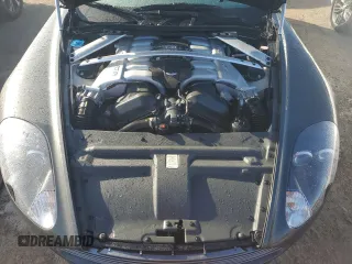 2005 Aston Martin DB9 z VIN SCFAD01A75GA02198, wystawiony jako Copart lot #75564554 z przebiegiem Nie podano mil oraz Nie do naprawy • Non repairable. Historia ofert i sprzedaży dostępna na DreamBid. Obrazek 11.