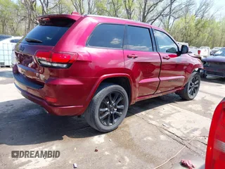 2022 Jeep Grand Cherokee Laredo X with VIN 1C4RJEAG2NC154339, listed as a IAAI auction lot 42004691 with 23,818 mi miles and . Bid and sale history available at DreamBid. Image 4.