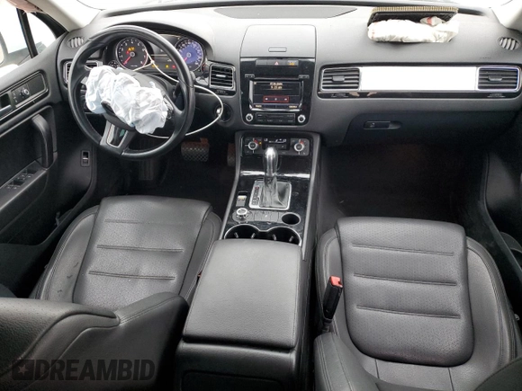 2014 Volkswagen Touareg Sport with VIN WVGEF9BP3ED005921, listed as a Copart auction lot 77372514 with 156,753 mi miles and Salvage Title. Bid and sale history available at DreamBid. Image 8.