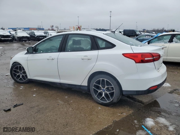2017 Ford Focus SEL with VIN 1FADP3H27HL209885, listed as a Copart auction lot 52646945 with 57,800 mi miles and Clean Title. Bid and sale history available at carsss.com. Image 2.
