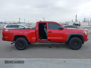 2020 Toyota Tacoma SR with VIN 3TYRX5GNXLT005469, listed as a IAAI auction lot 42267836 with 84,628 mi miles and . Bid and sale history available at DreamBid. Image 6.