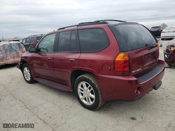 2007 GMC Envoy Denali with VIN 1GKET63MX72229013, listed as a Copart auction lot 84587704 with 103,318 mi miles and Salvage Title. Bid and sale history available at carsss.com. Image 2.