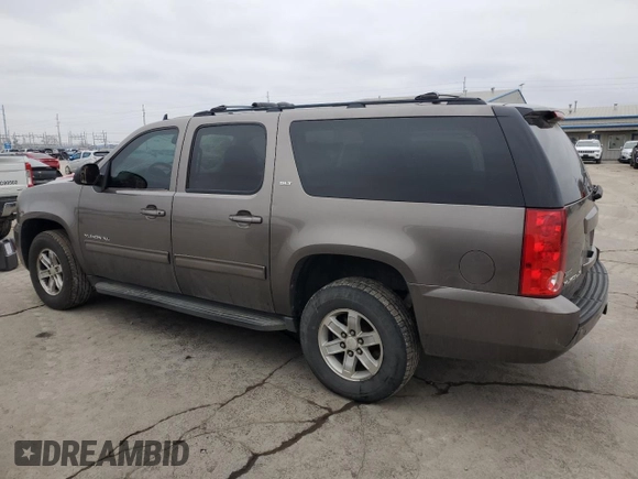 2012 GMC Yukon XL SLT with VIN 1GKS2KE75CR105108, listed as a Copart auction lot 45021015 with 241,894 mi miles and Clean Title. Bid and sale history available at carsss.com. Image 2.