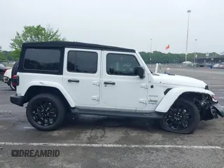 2022 Jeep Wrangler Unlimited Sahara with VIN 1C4JJXP69NW229124, listed as a IAAI auction lot 42525560 with 45,857 mi miles and . Bid and sale history available at DreamBid. Image 13.