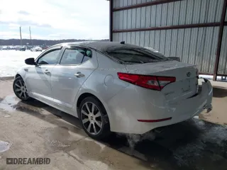 2013 Kia Optima SX with VIN 5XXGR4A66DG126012, listed as a IAAI auction lot 41378810 with 110,956 mi miles. Bid and sale history available at carsss.com. Image 3.