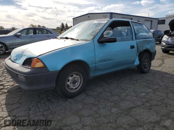 1992 Geo Metro z VIN 2C1MS2465N6782913, wystawiony jako Copart lot #77405574 z przebiegiem 77 080 mil mil oraz Szkody całkowita. Historia ofert i sprzedaży dostępna na DreamBid. Obrazek 1.