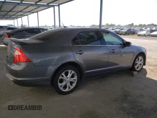 2012 Ford Fusion SE z VIN 3FAHP0HAXCR231865, wystawiony jako Copart lot #52644815 z przebiegiem 153 058 mil mil oraz Szkoda całkowita • Salvage title. Historia ofert i sprzedaży dostępna na DreamBid. Obrazek 3.