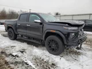 2024 GMC Canyon 4WD Denali with VIN 1GTP6FEK6R1295722, listed as a Copart auction lot 44948475 with 864 mi miles and Salvage Title. Bid and sale history available at carsss.com. Image 4.
