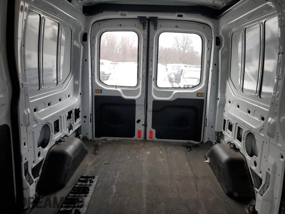 2015 Ford Transit Cargo with VIN 1FTYE1CM7FKA24477, listed as a Copart auction lot 86310214 with 54,098 mi miles and Salvage title. Bid and sale history available at DreamBid. Image 10.