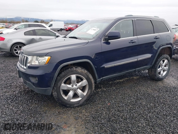 2012 Jeep Grand Cherokee Laredo with VIN 1C4RJFAG9CC220145, listed as a IAAI auction lot 41798457 with 130,603 mi miles. Bid and sale history available at carsss.com. Image 17.