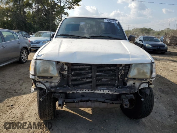 1999 Toyota Tacoma with VIN 4TAPM62N8XZ457624, listed as a Copart auction lot 71565904 with 133,851 mi miles and Salvage Title. Bid and sale history available at DreamBid. Image 5.