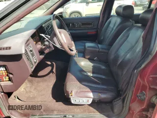 1994 Cadillac Fleetwood z VIN 1G6DW52P8RR719354, wystawiony jako Copart lot #77161044 z przebiegiem 154 480 mil mil oraz Tytuł czysty. Historia ofert i sprzedaży dostępna na DreamBid. Obrazek 7.