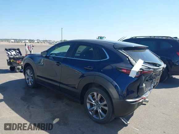 2021 Mazda CX-30 Preferred with VIN 3MVDMBCLXMM202269, listed as a IAAI auction lot 42234251 with 41,702 mi miles and . Bid and sale history available at DreamBid. Image 3.