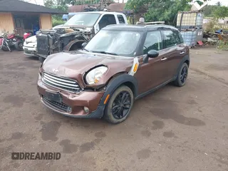 2014 MINI Countryman with VIN WMWZB3C51EWR36737, listed as a IAAI auction lot 41741248 with 69,717 mi miles and . Bid and sale history available at DreamBid. Image 18.