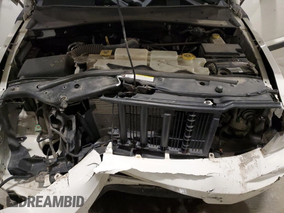 2010 Jeep Liberty Sport with VIN 1J4PN2GK2AW115064, listed as a Copart auction lot 57344645 with 114,275 mi miles and Salvage title. Bid and sale history available at DreamBid. Image 12.