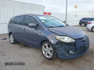2009 Mazda 5 Sport with VIN JM1CR29L990341261, listed as a IAAI auction lot 41522567 with 123,465 mi miles and . Bid and sale history available at DreamBid. Image 1.