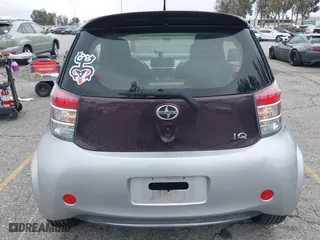 2014 Scion iQ with VIN JTNJJXB01EJ028930, listed as a IAAI auction lot 41771879 with 113,364 mi miles. Bid and sale history available at carsss.com. Image 16.