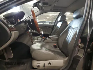 2005 Maserati Quattroporte z VIN ZAMCE39A350017390, wystawiony jako Copart lot #72455664 z przebiegiem 50 394 mil mil oraz Szkoda całkowita • Salvage title. Historia ofert i sprzedaży dostępna na DreamBid. Obrazek 7.