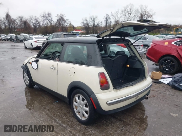 2004 MINI Hardtop with VIN WMWRC33434TJ60941, listed as a IAAI auction lot 39078161 with 143,107 mi miles and . Bid and sale history available at DreamBid. Image 3.
