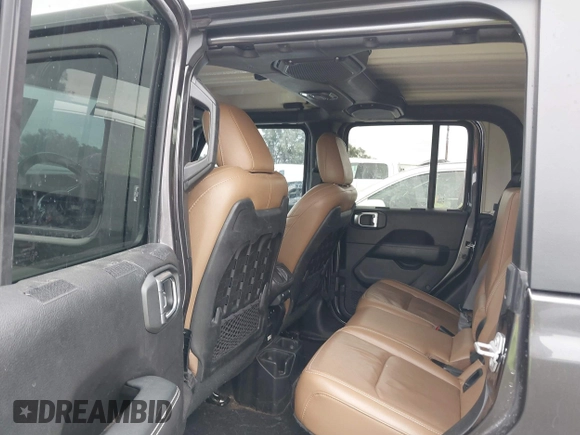 2020 Jeep Gladiator Rubicon with VIN 1C6JJTBG8LL135573, listed as a IAAI auction lot 41585896 with 79,070 mi miles and . Bid and sale history available at DreamBid. Image 8.