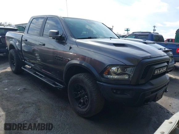 2017 Ram 1500 Rebel z VIN 1C6RR7YT0HS784756, wystawiony jako IAAI lot #41543549 z przebiegiem 146 727 mil mil oraz . Historia ofert i sprzedaży dostępna na DreamBid. Obrazek 1.