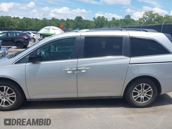 2012 Honda Odyssey EX-L with VIN 5FNRL5H65CB076534, listed as a IAAI auction lot 42440258 with 150,866 mi miles and . Bid and sale history available at DreamBid. Image 15.