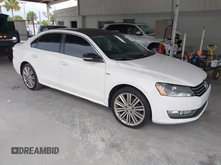 2014 Volkswagen Passat SE with VIN 1VWBT7A38EC078773, listed as a IAAI auction lot 42646654 with 138,440 mi miles and . Bid and sale history available at DreamBid. Image 1.