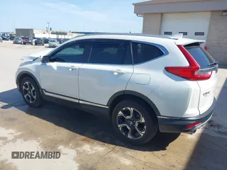 2018 Honda CR-V Touring with VIN 2HKRW2H92JH662753, listed as a IAAI auction lot 39538586 with 83,202 mi miles. Bid and sale history available at carsss.com. Image 3.
