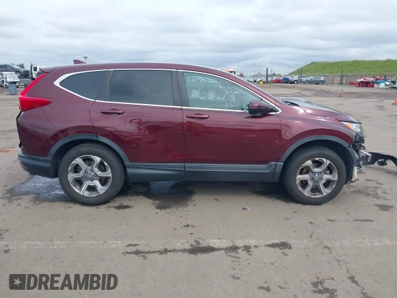 2019 Honda CR-V EX with VIN 7FARW2H56KE053022, listed as a IAAI auction lot 41848570 with 128,676 mi miles. Bid and sale history available at carsss.com. Image 14.