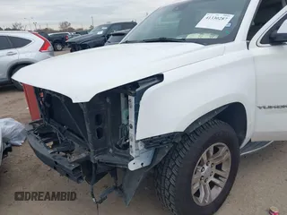2015 GMC Yukon XL SLT with VIN 1GKS1HKCXFR652337, listed as a IAAI auction lot 41330287 with 139,268 mi miles. Bid and sale history available at carsss.com. Image 6.