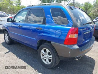 2007 Kia Sportage LX z VIN KNDJF723277303270, wystawiony jako IAAI lot #42388973 z przebiegiem 170 284 mil mil oraz . Historia ofert i sprzedaży dostępna na DreamBid. Obrazek 3.