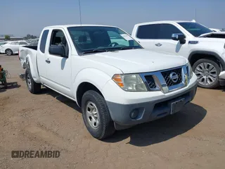 2015 Nissan Frontier S z VIN 1N6BD0CT9FN710476, wystawiony jako IAAI lot #42564491 z przebiegiem 220 560 mil mil oraz . Historia ofert i sprzedaży dostępna na DreamBid. Obrazek 1.