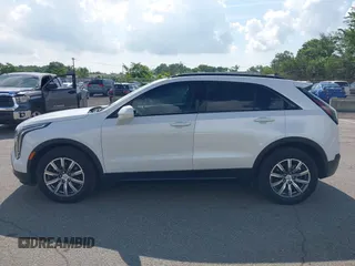 2020 Cadillac XT4 FWD Sport with VIN 1GYFZER4XLF116224, listed as a IAAI auction lot 42759271 with 31,395 mi miles and . Bid and sale history available at DreamBid. Image 14.