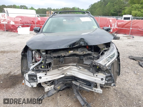 2021 Toyota RAV4 Hybrid XLE with VIN JTMRWRFV2MD133113, listed as a IAAI auction lot 42087394 with 103,019 mi miles and . Bid and sale history available at DreamBid. Image 12.