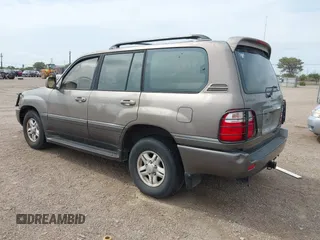 1999 Lexus LX 470 with VIN JT6HT00W8X0068157, listed as a IAAI auction lot 41955366 with 291,014 mi miles and . Bid and sale history available at DreamBid. Image 3.